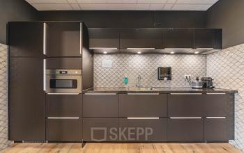 Compact pantry with modern cabinetry at Goeman Borgesiuslaan 77, Utrecht North, suitable for office space rental.