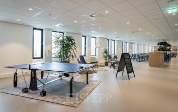 Spacious and modern furnished office interior in Utrecht Papendorp with a meeting area and leisure facilities, perfect for office space rental.