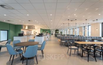 Spacious, modern office space at Van Deventerlaan 31-51, Utrecht Papendorp, featuring open floorplan with contemporary furnishings and ample natural light, perfect for workspaces.