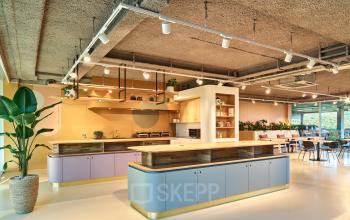 Bright and modern office space available for rent at Van Deventerlaan 30-40, Utrecht Papendorp, featuring stylish kitchen facilities and comfortable seating areas.