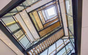 Interior view of the stairwell in Newtonlaan 115 office building in Utrecht Rijnsweerd, highlighting modern architecture for office space rental.