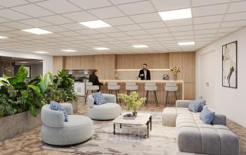 Modern office space with stylish furnishings, featuring a sitting area and people engaging in a meeting, located at Newtonlaan 115, an ideal office to rent in Utrecht Rijnsweerd.