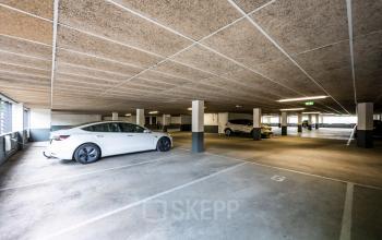 Spacious and well-lit underground parking area available with office space rental at Weg der Verenigde Naties 1, Utrecht.