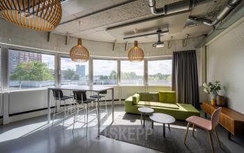 Modern office space rental at Weg der Verenigde Naties 1 in Utrecht featuring stylish furnishings and abundant natural light.
