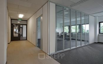 Modern glass-partitioned office space rental at Winthontlaan 200, Utrecht South, with a professional, clean design.