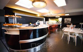 Furnished office interior at Kaldenkerkerweg 20, Venlo, featuring a modern pantry area with seating available for rent office space.