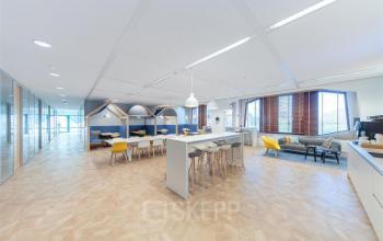 Bright, spacious office to rent with stylish furnishings, located at Loire 104 - 206, Voorburg. The open layout features modern seating and workstations ideal for collaborative work. Perfect for office space rental.