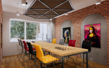 Nowoczesne biura do wynajęcia przy ulicy Skierniewicka 10A, Warszawa Wola, z designerskim wnętrzem i stołem konferencyjnym.