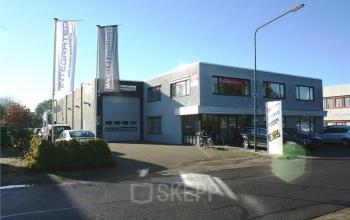 Modern office space rental at Touwslagersweg 6 in Woerden with well-maintained exterior and clear signage.