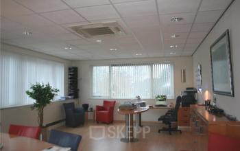 Well-appointed office space rental at Touwslagersweg 6, Woerden, featuring a tidy workspace with desks, chairs, and ample lighting.
