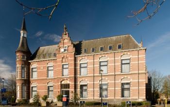 Elegant brick office building at Zaagmolenlaan 12, Woerden, showcasing impressive architecture, ideal for office space rental.