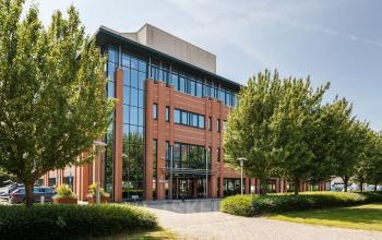 Exterior view of the office building at Vijzelmolenlaan 9 in Woerden, showcasing modern architecture perfect for office space rental.