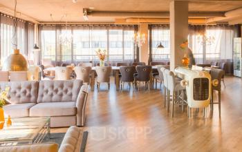 Spacious office lounge at Zaagmolenlaan 4, Woerden, with chic seating areas and stylish decor, perfect for informal meetings or relaxation.