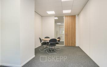 Interior view of an unfurnished office space at Huis ter Heideweg 24, Zeist, available for office space rental.