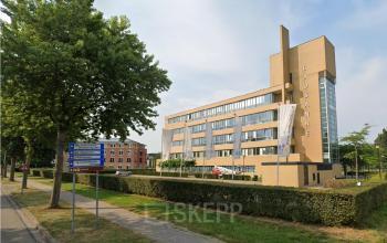 Exterior view of the office building at Baron de Coubertinlaan 35, Zoetermeer, showcasing its modern architectural design. Ideal for companies seeking office space rental in a vibrant location.