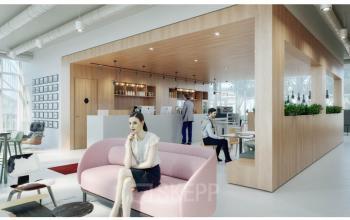 Elegant office space rental at Dufourstrasse 49, Zürich Seefeld, featuring a modern design with a woman sitting on a pink sofa, people working in the background.